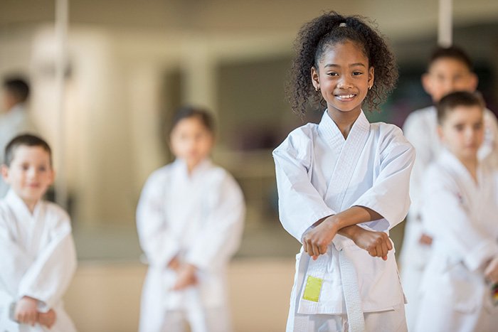 young students in karate class